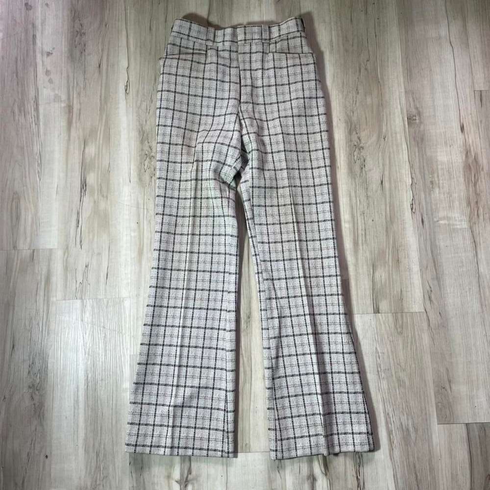 Vintage 1970s hand-tailored plaid trousers with a flared leg